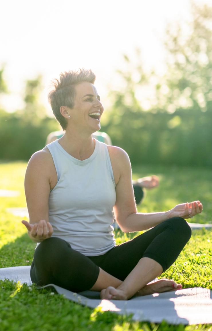 A group sitting in Kings Park, Perth on mats enjoying a mindful experience, Western Australia © Mindful in Nature