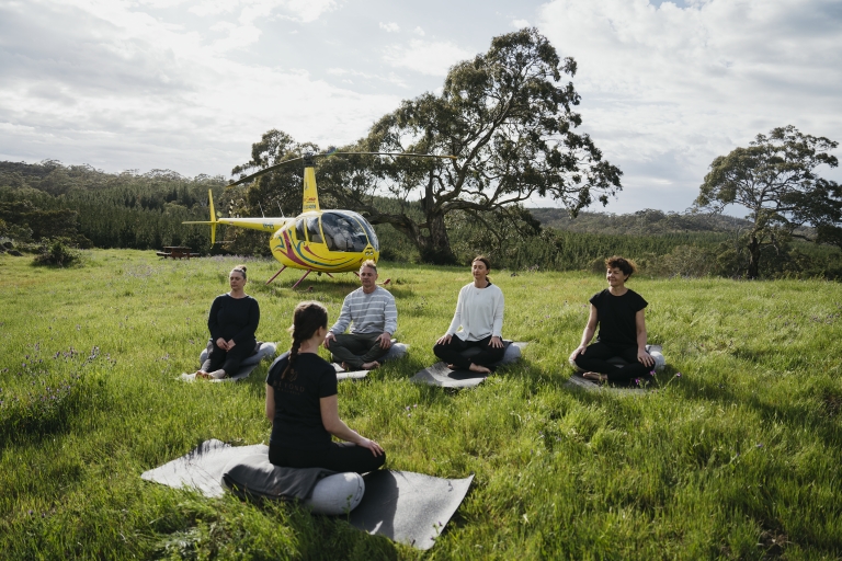 A group yoga session in the Barossa Valley in The Kaiserstuhl Conservation Park, South Australia © Barossa Helicopters A group yoga session in the Barossa Valley in The Kaiserstuhl Conservation Park, South Australia © Barossa Helicopters