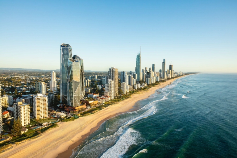 An aerial view over Surfers Paradise Beach captures a lively scene under bright sunshine, Gold Coast, Queensland © Tourism Australia An aerial view over Surfers Paradise Beach captures a lively scene under bright sunshine, Gold Coast, Queensland © Tourism Australia