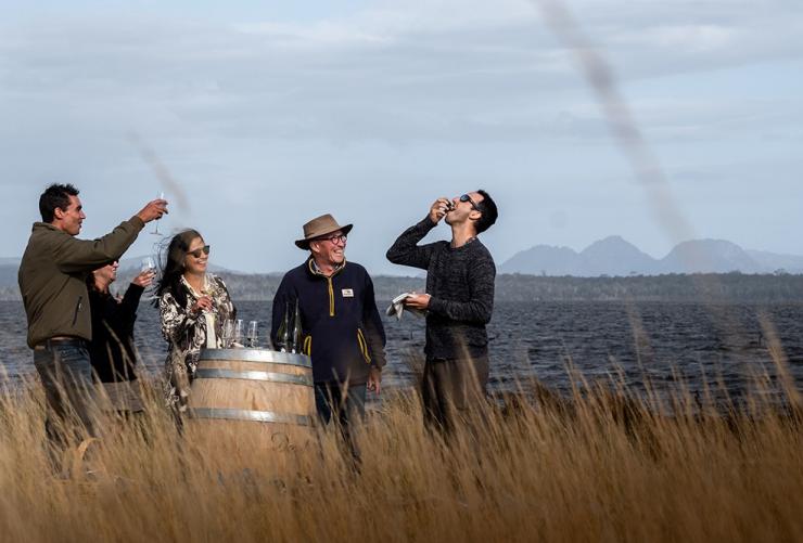 Oyster shucking and tasting on the Moulting Lagoon Experience at Devil's Corner, Freycinet, Tasmania © Devil's Corner